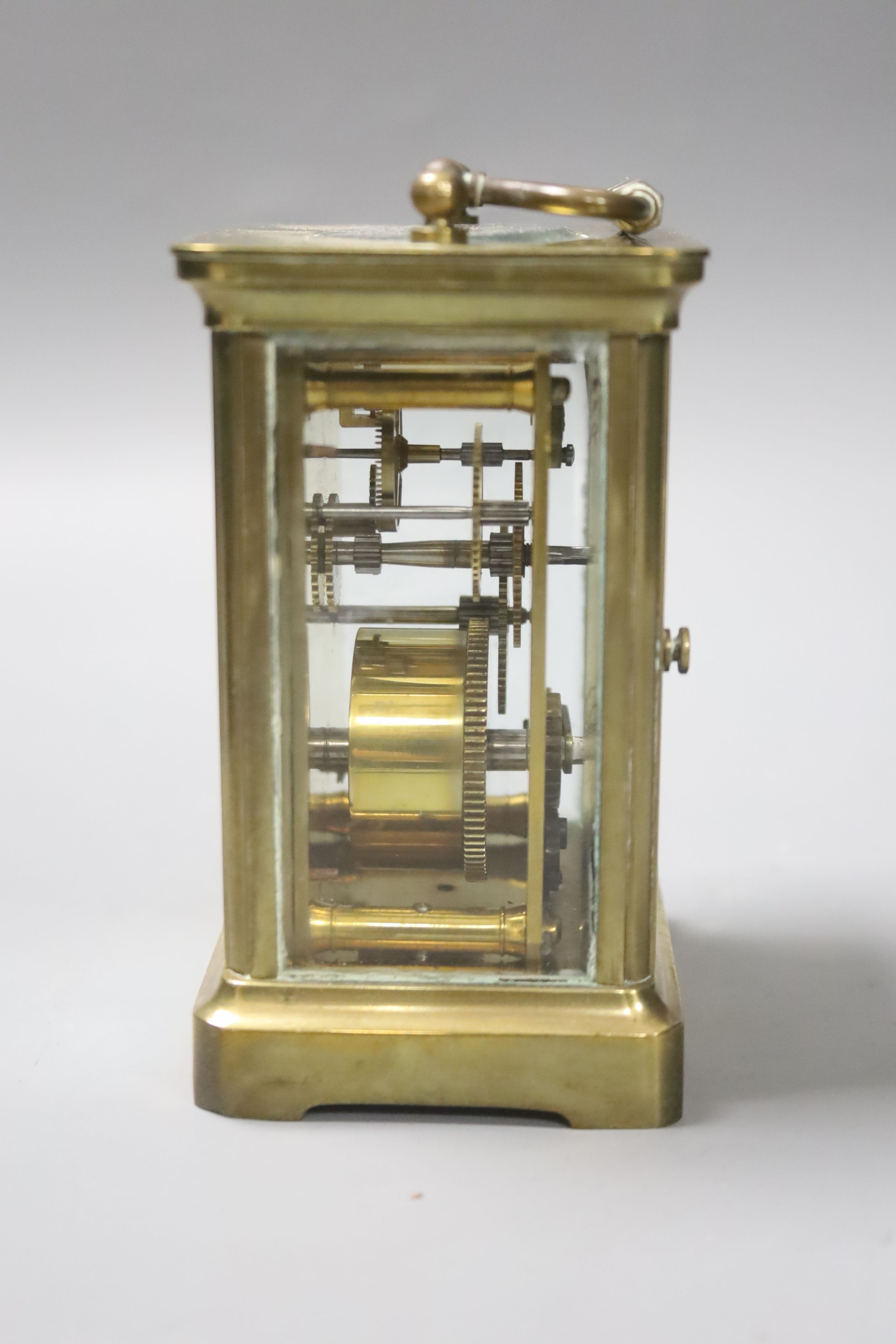 A cased brass carriage timepiece